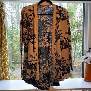 Belladini asymmetric light beige cardigan.